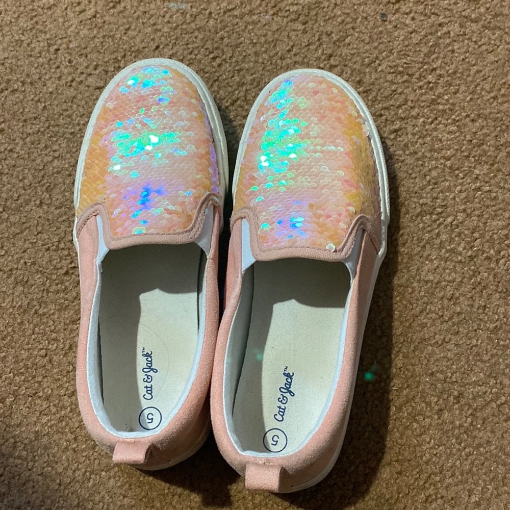 I’m selling this pink sequin shoes, there in good condition & really recommend